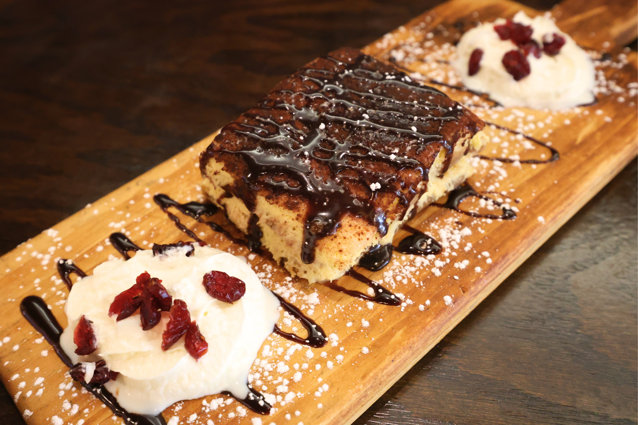 Chocolate dessert board with whipped cream